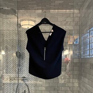 MELISSA NEPTON black V-Neck Blouse. Reversible